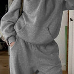 Devine Long Sleeve Hooded Jumpsuit with Pockets Trendsi