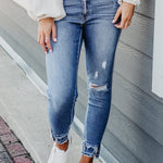 Raw Hem Distressed Jeans with Pockets Trendsi